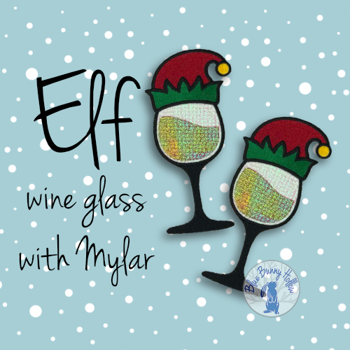 Mylar elf wine glass embroidery showing red wine effect and festive holiday details.