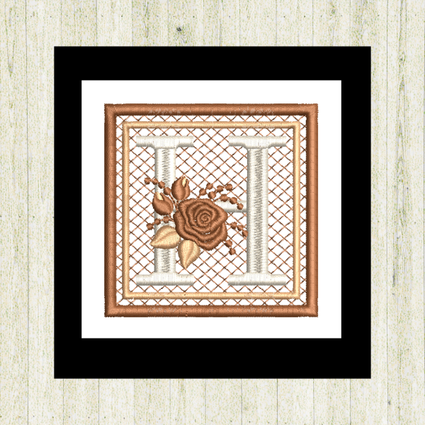 Cream "H", rose-monogram mini quilt machine embroidery design featuring decorative alphabet letters stitched 100% in the hoop for personalized home décor and gift giving.