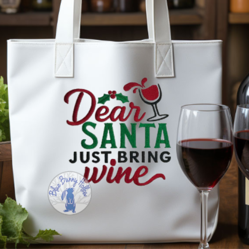 Funny Christmas wine quote embroidery with holiday accents.