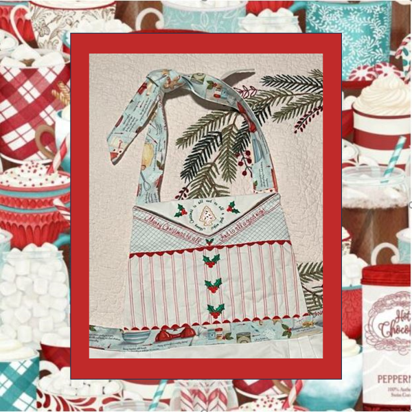Retro Christmas In the Hoop apron with embroidered bib panels, rick rack accents, holly motifs, vintage cookie cutter designs, and holiday text.