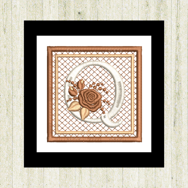 Cream "Q", rose-monogram mini quilt machine embroidery design featuring decorative alphabet letters stitched 100% in the hoop for personalized home décor and gift giving.
