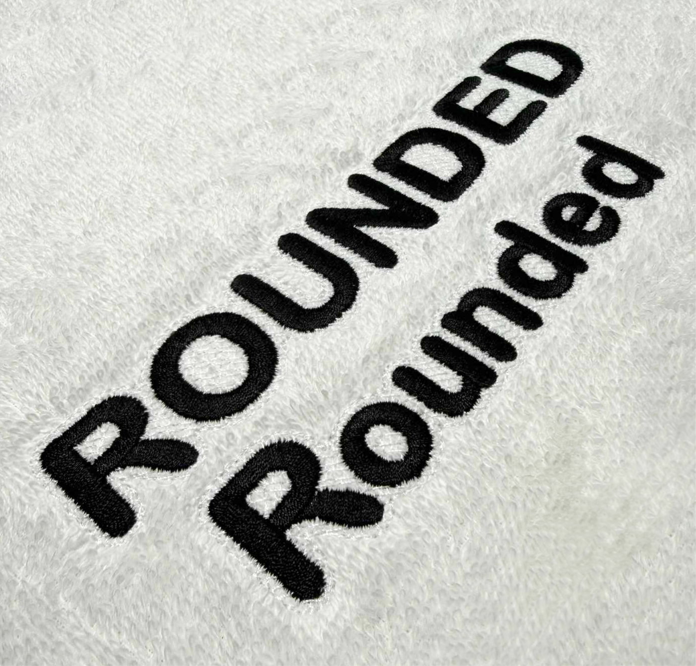 Rounded font with knockdown for custom embroidery digitizing.