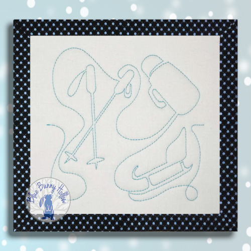 Skiing E2E quilting design with ski poles and sleigh.