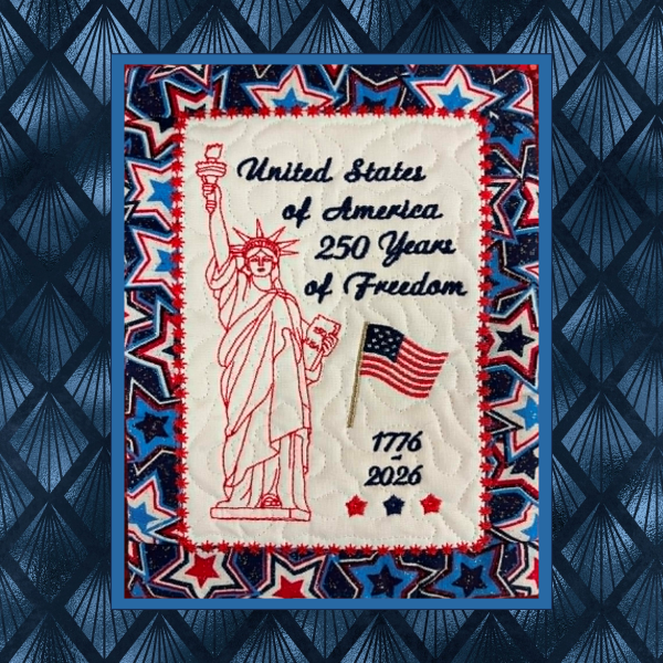 Patriotic in-the-hoop machine embroidery wall hanging, with wide borders,  featuring the Statue of Liberty in redwork with American flag and 250 years of freedom commemorative text.