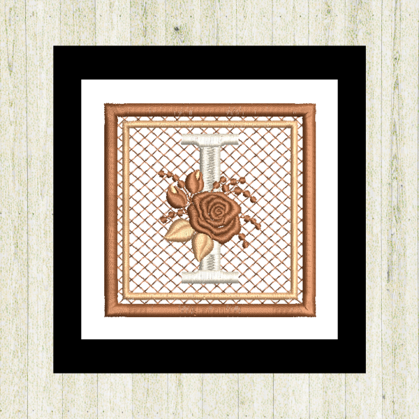 Cream "I", rose-monogram mini quilt machine embroidery design featuring decorative alphabet letters stitched 100% in the hoop for personalized home décor and gift giving.