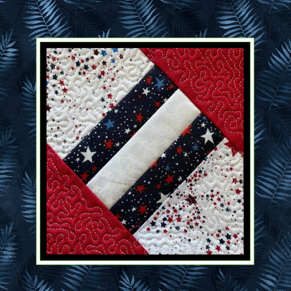 Patriotic three-stripe in-the-hoop quilt block design in red white and blue featuring geometric pieced embroidery squares forming a 12-inch quilt layout-2.