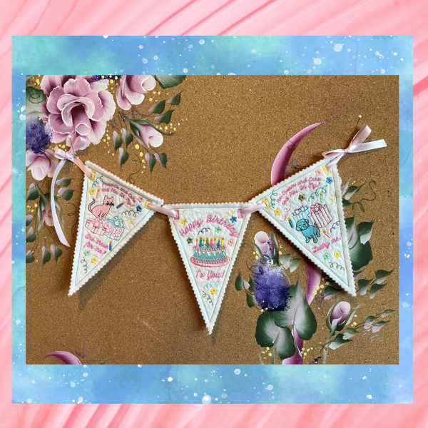 Reusable Happy Birthday bunting machine embroidery design stitched in the hoop on felt with three triangle pennants featuring a birthday cake, gifts, animals, pinked edges, and ribbon ties.