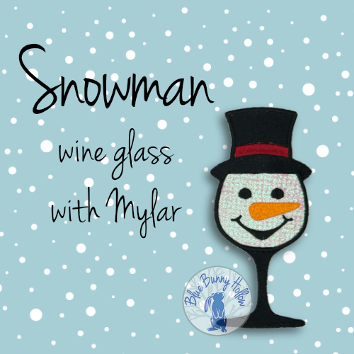 Snowman wine glass embroidery design with Mylar shine and smiling snowman face.