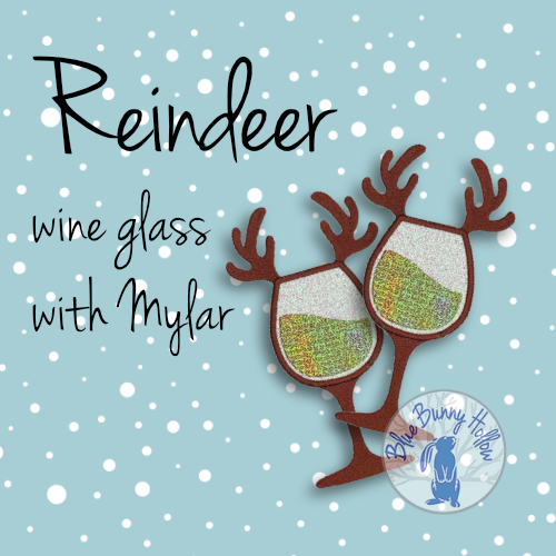 Christmas Mylar embroidery showing reindeer antler wine glass with red wine effect.