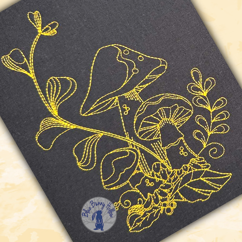 Close-up of Fairy Parasol Mushroom showing fine embroidery details stitched with 60-weight thread.