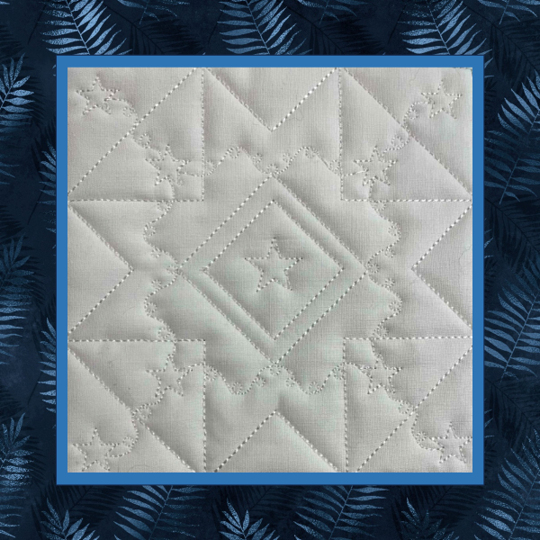 Classic Churn Dash quilt block machine embroidery design, quilted with stars and bubbles to coordinate with pieced Churn Dash, In the Hoop, quilt block.