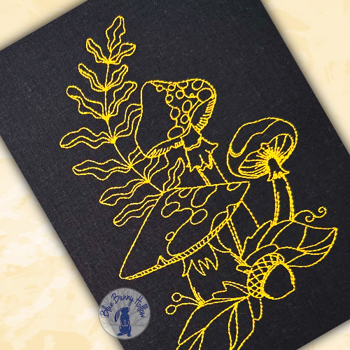 Close-up of Forest Mushroom embroidery showing detailed line work stitched with 60-weight thread.