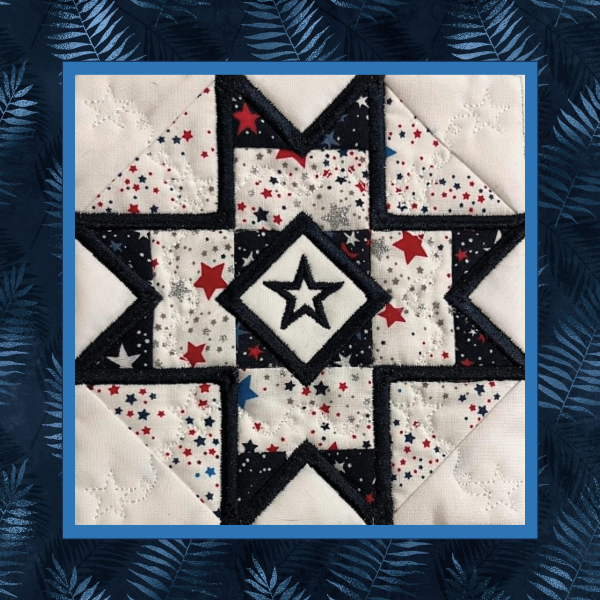 Classic Churn Dash quilt block machine embroidery design stitched in patriotic red, white, and blue fabrics with coordinating quilted star block included, created entirely in the hoop.