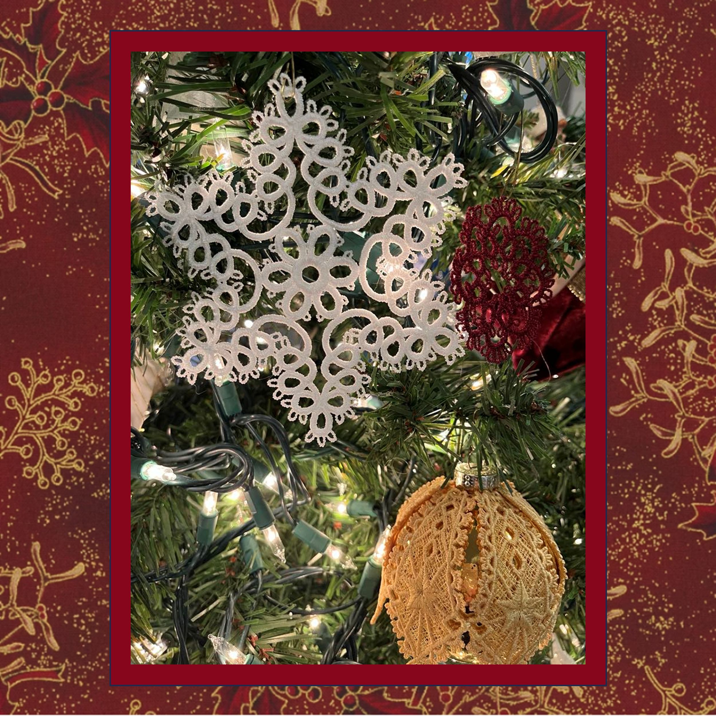 A delicate tatted free-standing lace star snowflake ornament, stitched in a white thread color on an elegant Christmas tree.