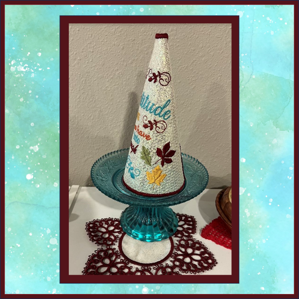In-the-hoop lace cone-shaped tree embroidery design — right side view