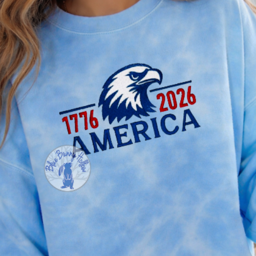 Patriotic America machine embroidery design with eagle and 1776–2026 dates.