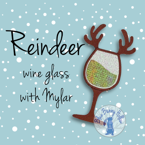 Reindeer wine glass embroidery design with Mylar shine and antlers.