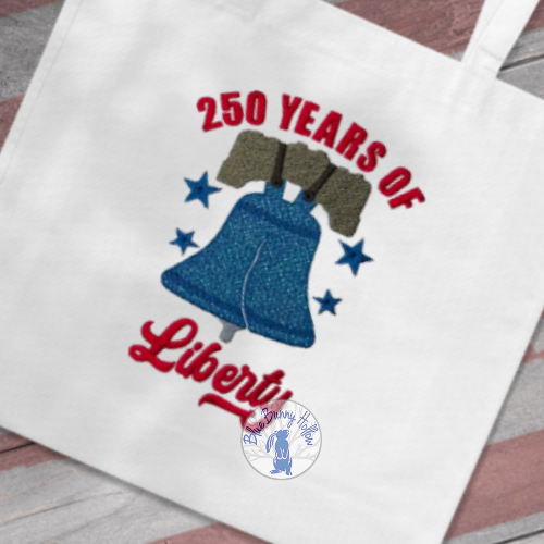 Patriotic Liberty Bell embroidery design with sparkly Mylar accents.