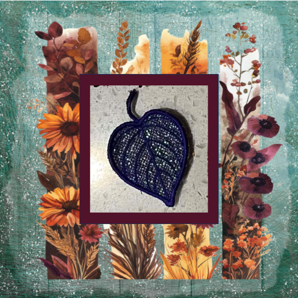 Lace heart-shaped leaf with shimmering Mylar applique and intricate lace embroidery, perfect for fall and autumn projects.