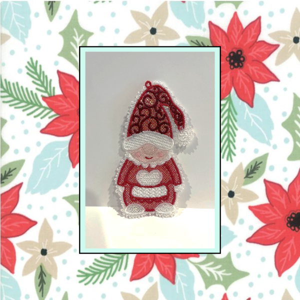 In the Hoop Mrs Santa Gnome Tatted FSL Mylar Machine Embroidery Ornament Design — red lace hat, heart apron bib, rosy cheeks, and shimmering Mylar details, perfect for Christmas decor.