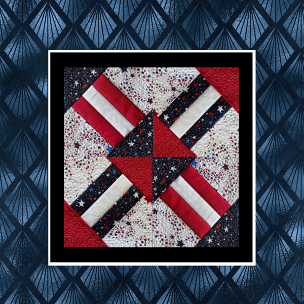 Patriotic three-stripe in-the-hoop quilt block design in red white and blue featuring geometric pieced embroidery squares forming a 12-inch quilt layout.