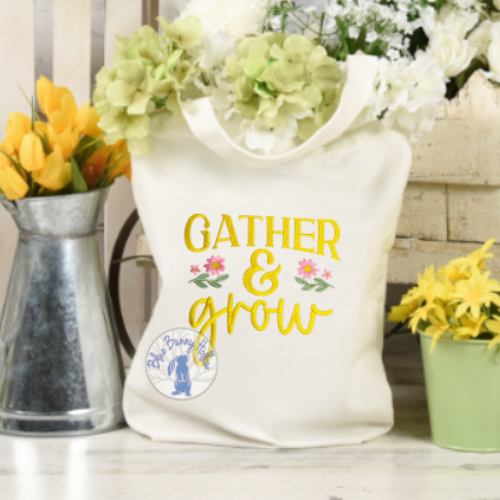 Spring floral embroidery with decorative lettering and accents.