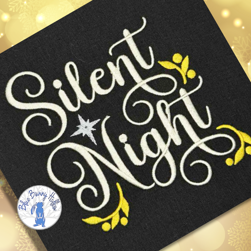 Christmas script embroidery cream lettering star accent.