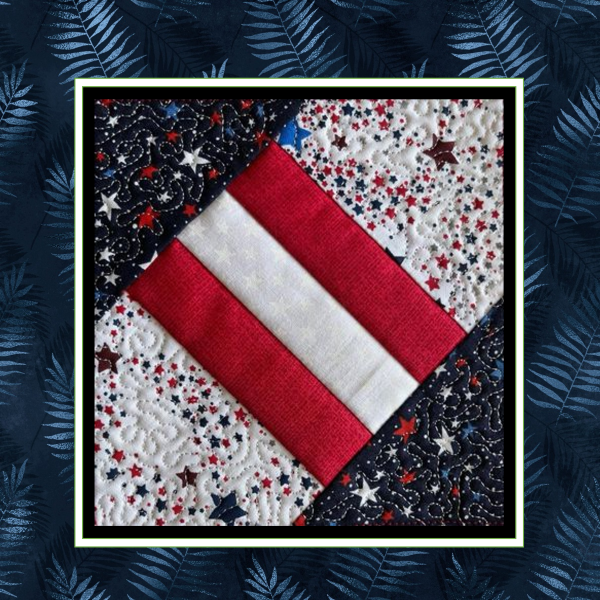 Patriotic three-stripe in-the-hoop quilt block design in red white and blue featuring geometric pieced embroidery squares forming a 12-inch quilt layout-3.