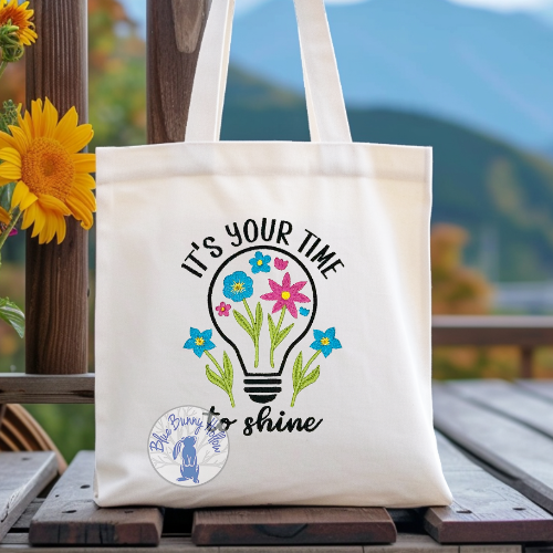 Embroidery bundle with lightbulb for inspiration and flowers.