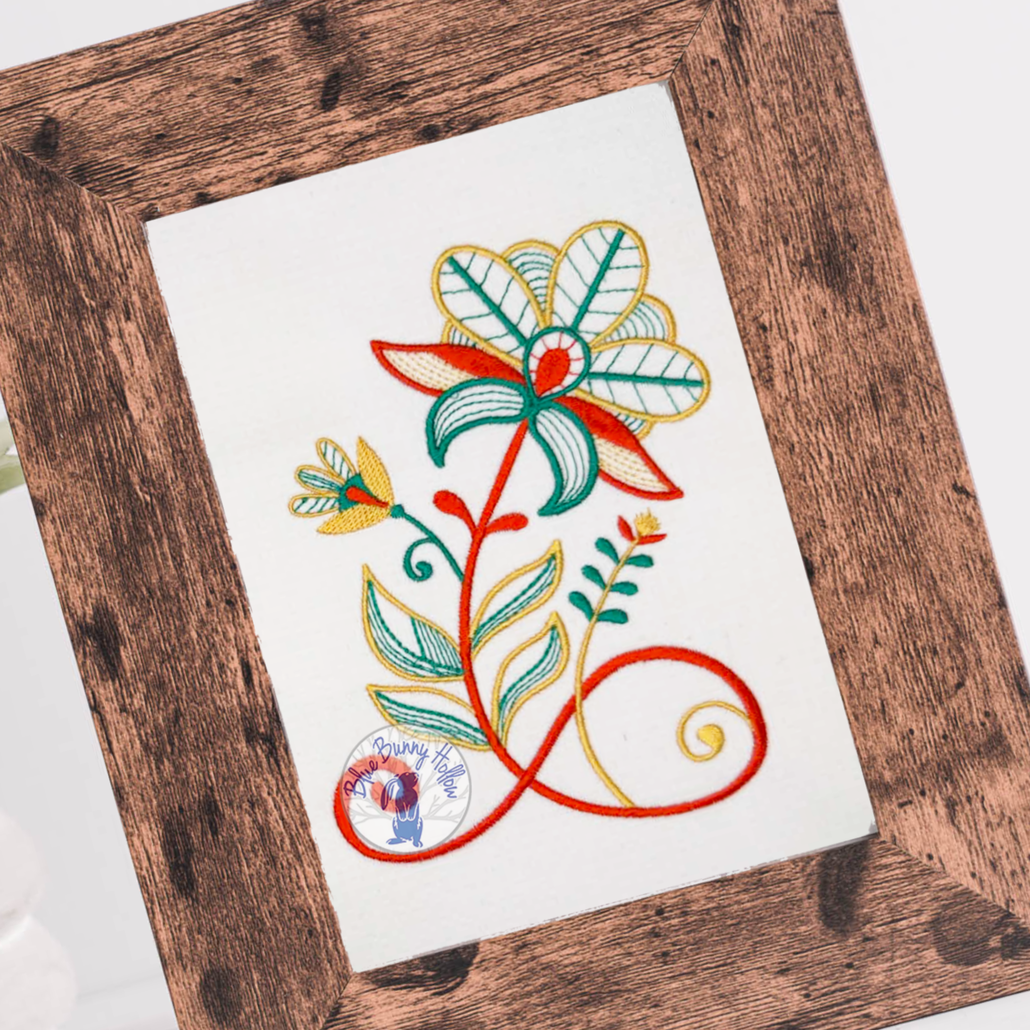 Decorative wild blossom machine embroidery design for pillows and tote bags.