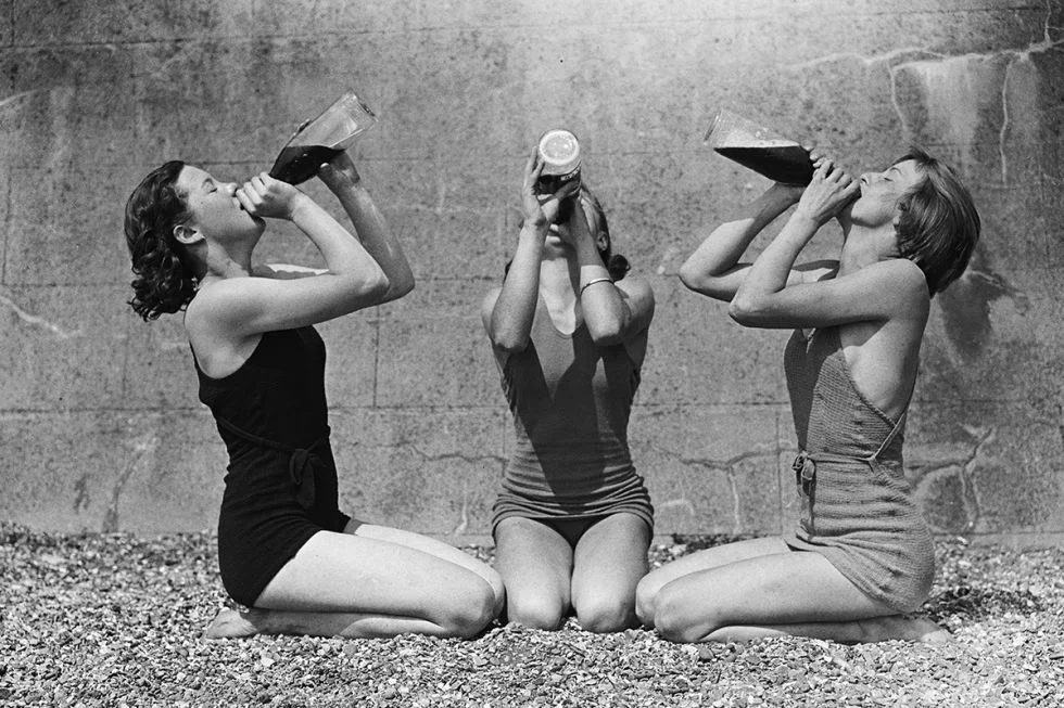 ladies chugging bottles.jpg