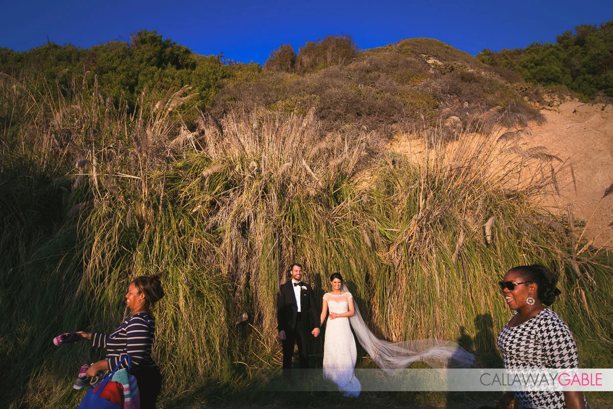 Funny wedding photo on the beach in Laguna Niguel