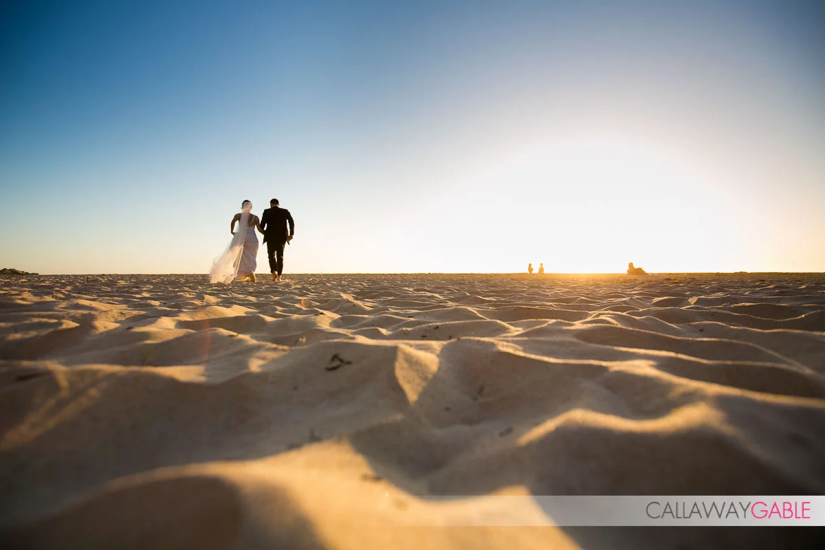 Walking on the beach wedding photo in Laguna Niguel