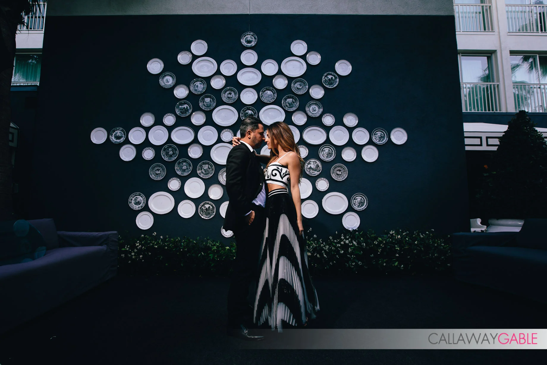 Viceroy Santa Monica Engagement in front of plates