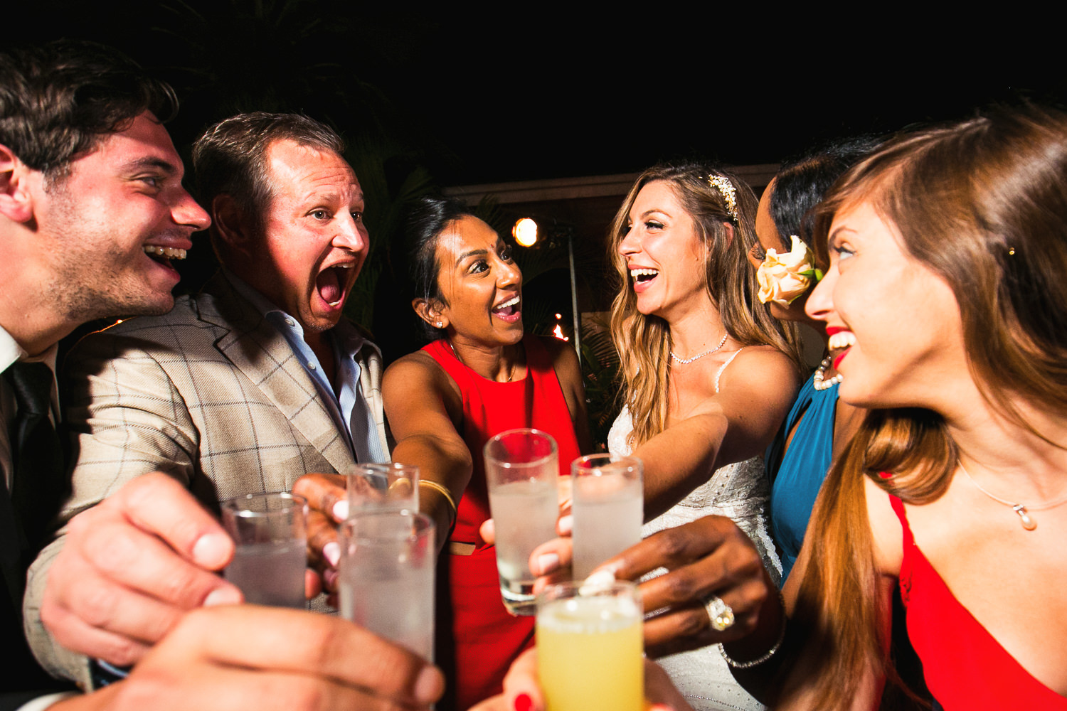 Party time at an awesome wedding at Reception on the lawn at a Outdoor Wedding at the Four Seasons Hualalai