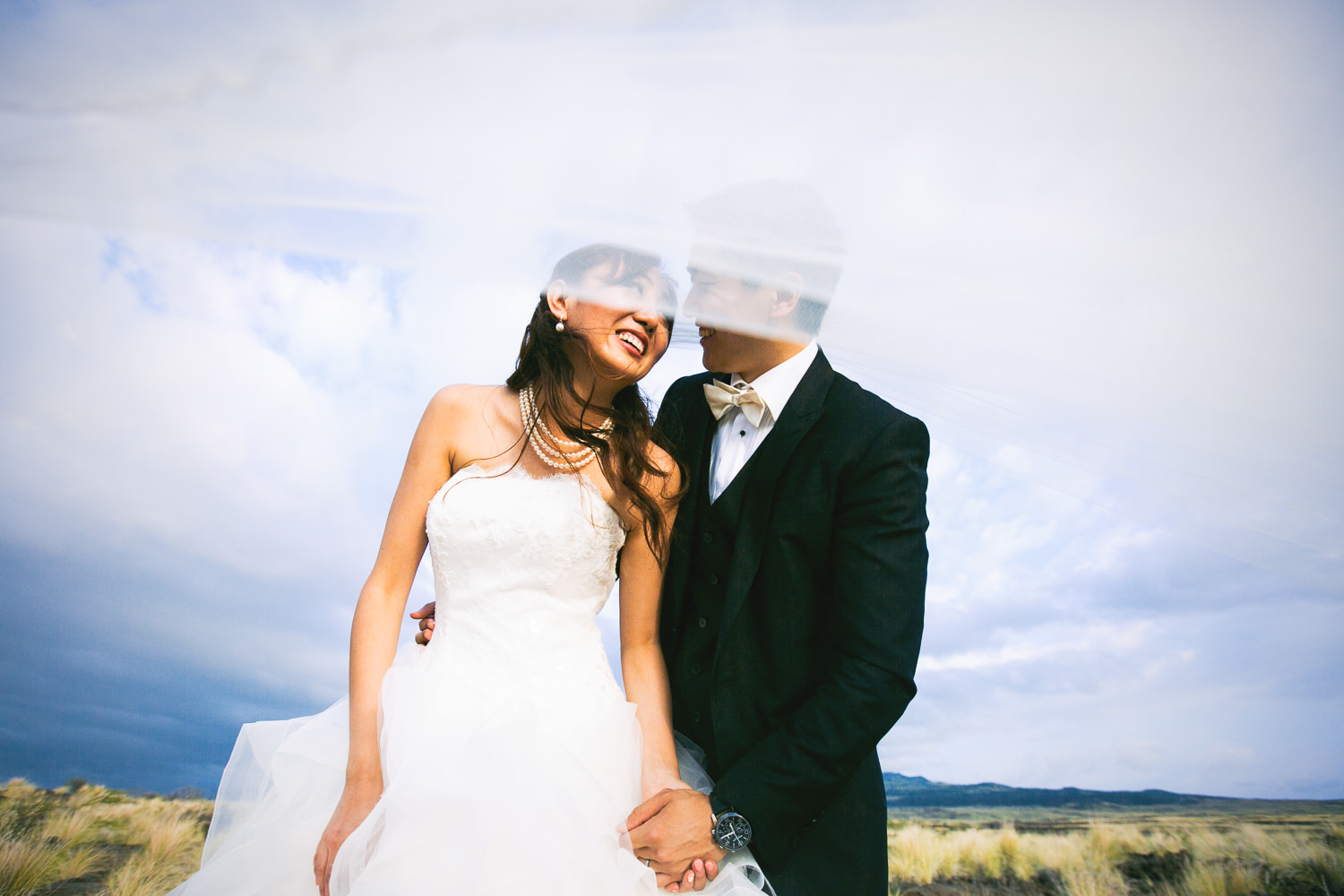 Another Four Seasons Hualalai Wedding portrait in lava fields of Kona