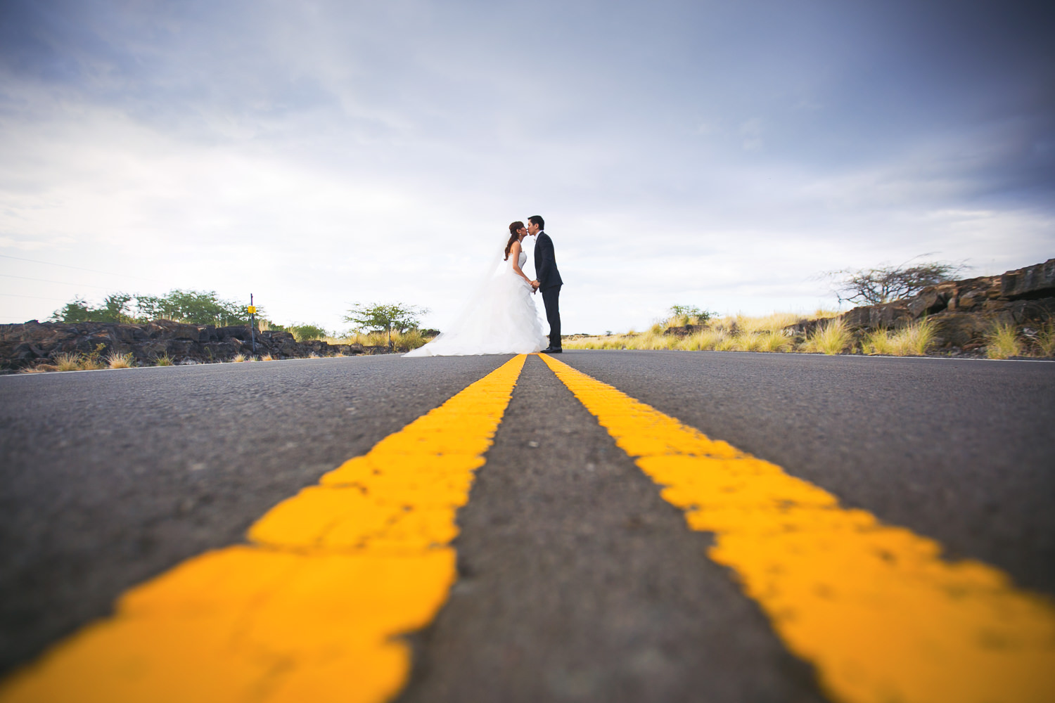 Wedding Portrait of Bride and groom on the road in Kona on Big Island