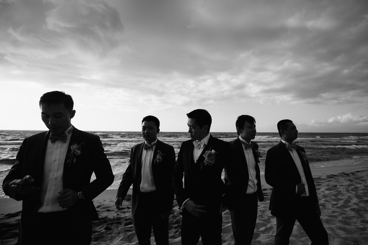 Groomsmen on the beach at Four Seasons Hualalai wedding