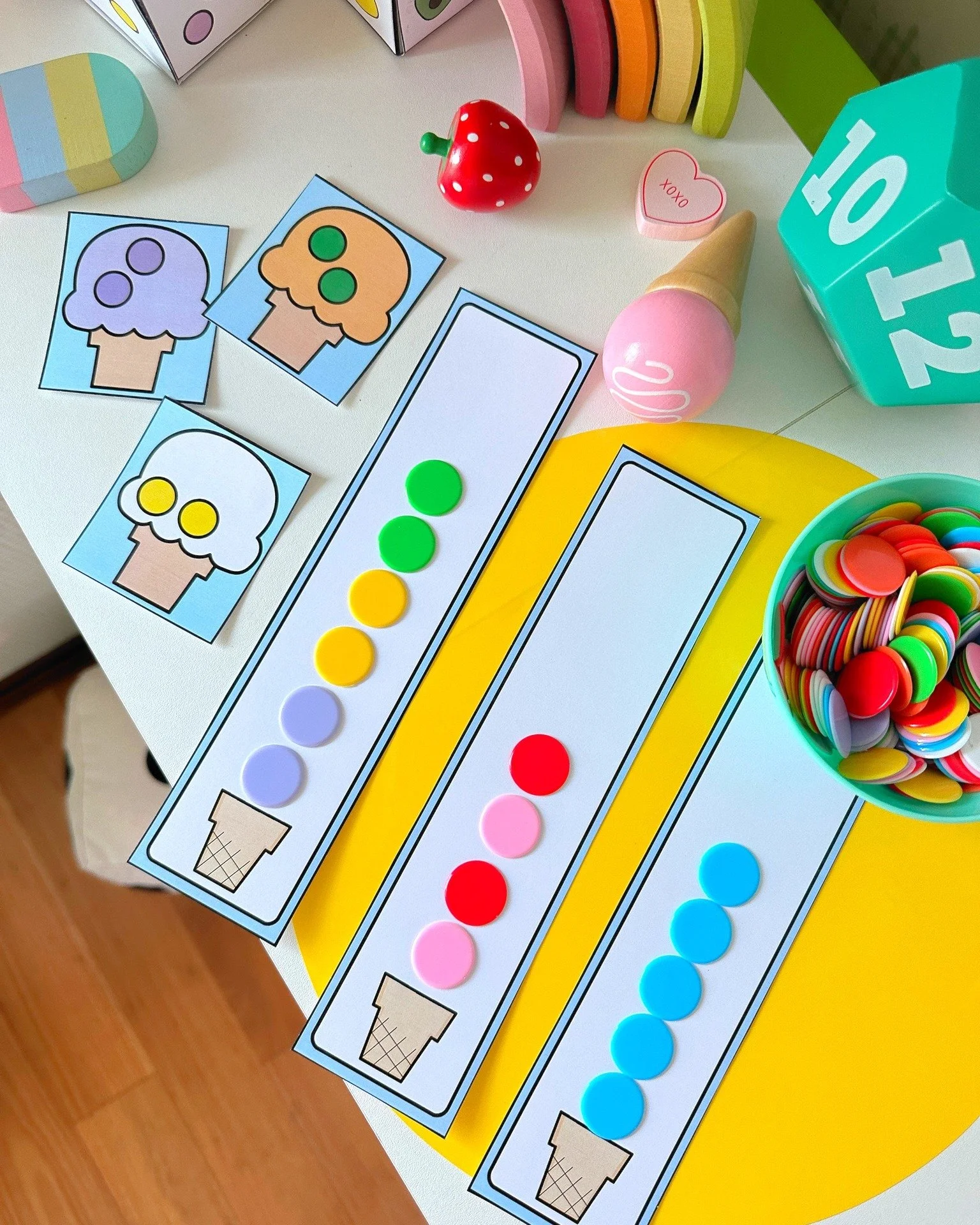 🍦 Math warm-up idea for this week! 🍦

These simple Ice Cream Cone Play Mats are so fun for hands-on counting, patterns, estimating, adding, subtracting, and math storytelling!

Just print, add colored counters + dice, and your students are ready to