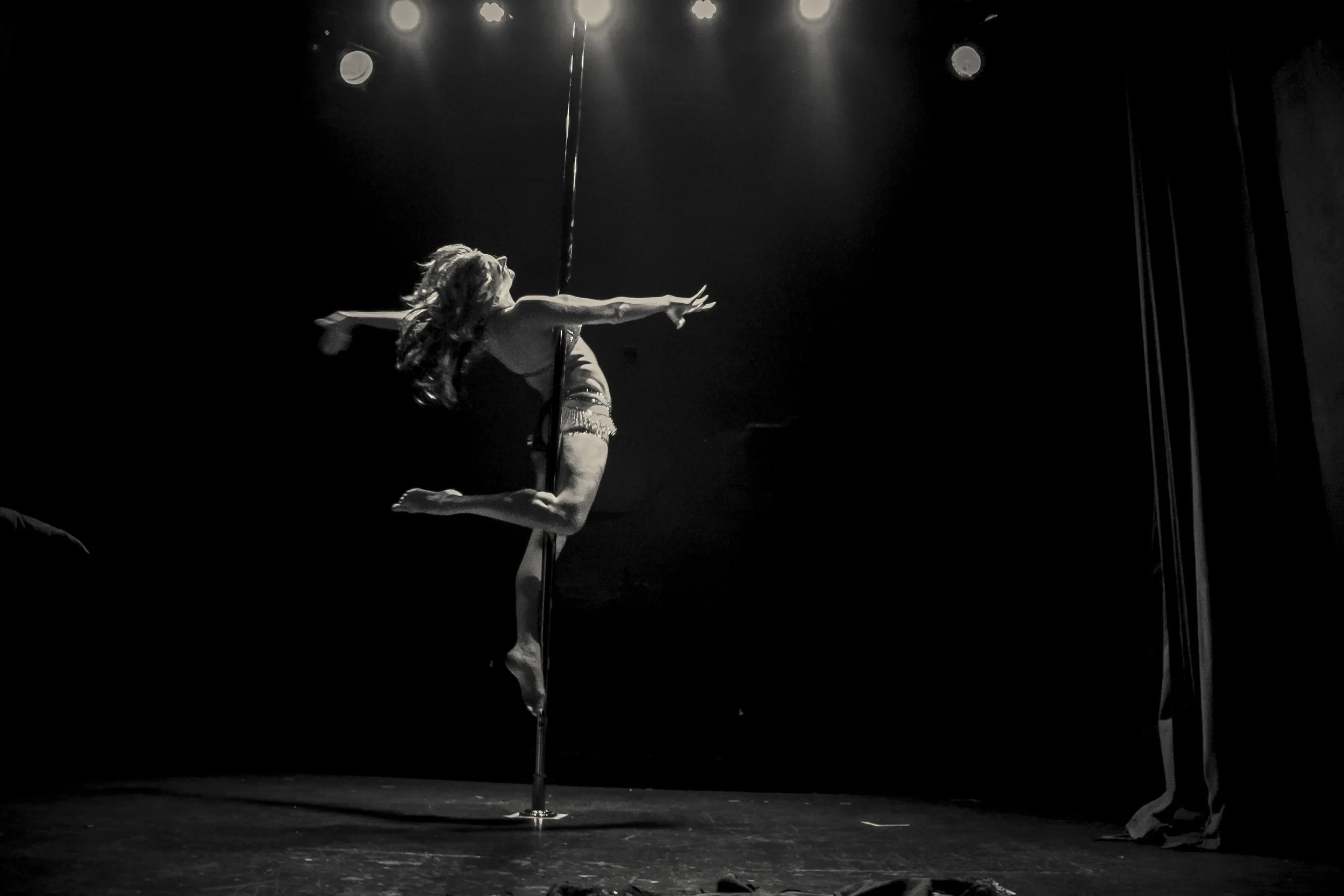 Maggie Nation IG: @1nationstyle Before discovering pole, Maggie had established a strong and diverse background in dance, with an emphasis on ballet, tap, jazz, modern and African dance. She has been teaching pole dance for over four years, and enjoys performing and mixing burlesque and pole. When she's not in the studio you can usually find her crafting intricate and sparkly costumes and props for the performance community. Maggie is most grateful for the confidence, strength, and beauty pole has given her, and looks to share those gifts with everyone who comes though our doors.