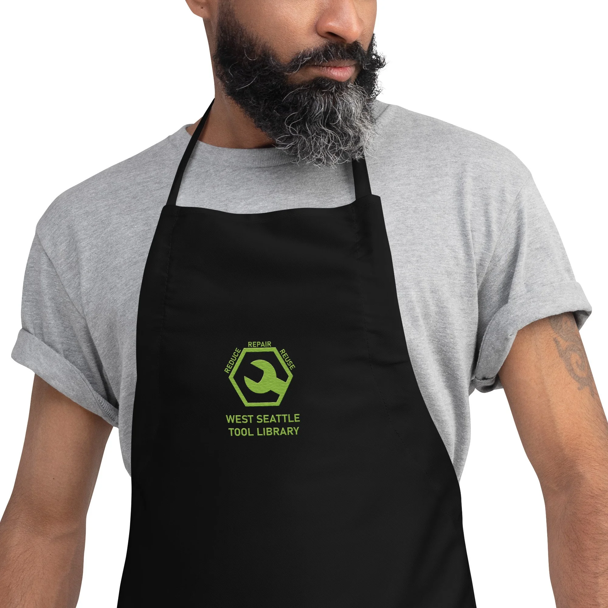 embroidered-apron-black-zoomed-in-691a211e115b3.jpg