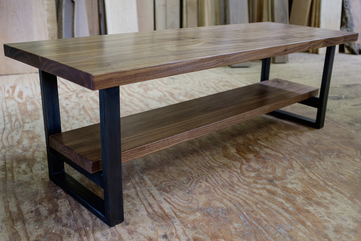 Walnut coffee table with steel base.