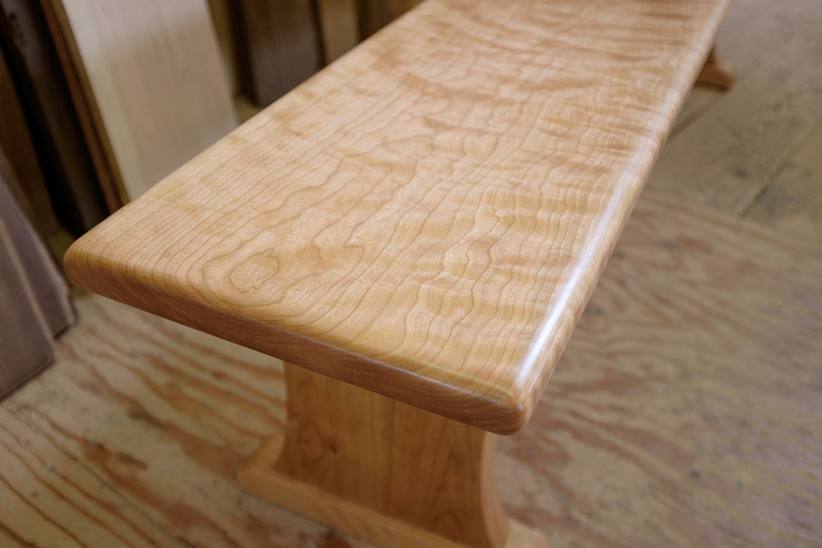 Detail of curly cherry bench top.