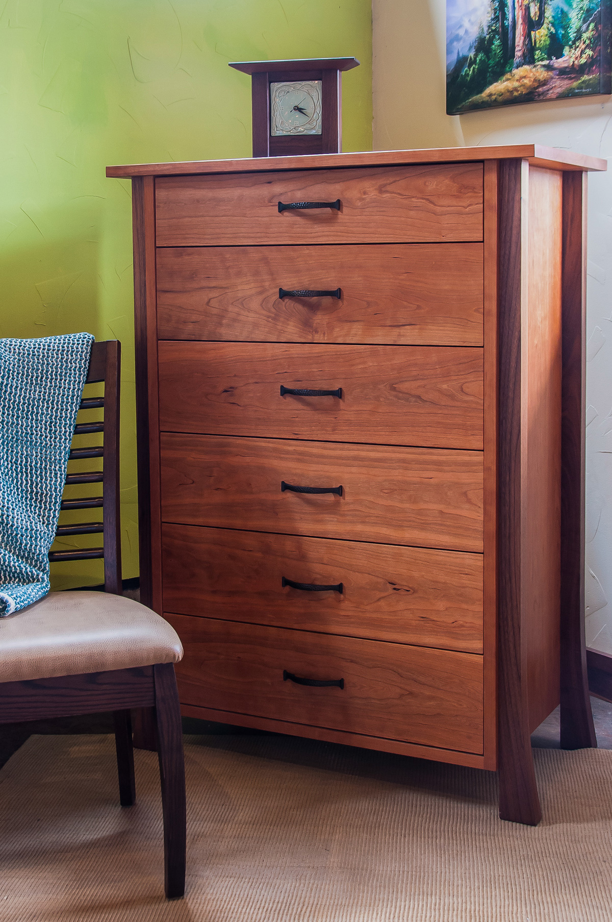 Cherry six drawer dresser with walnut legs.