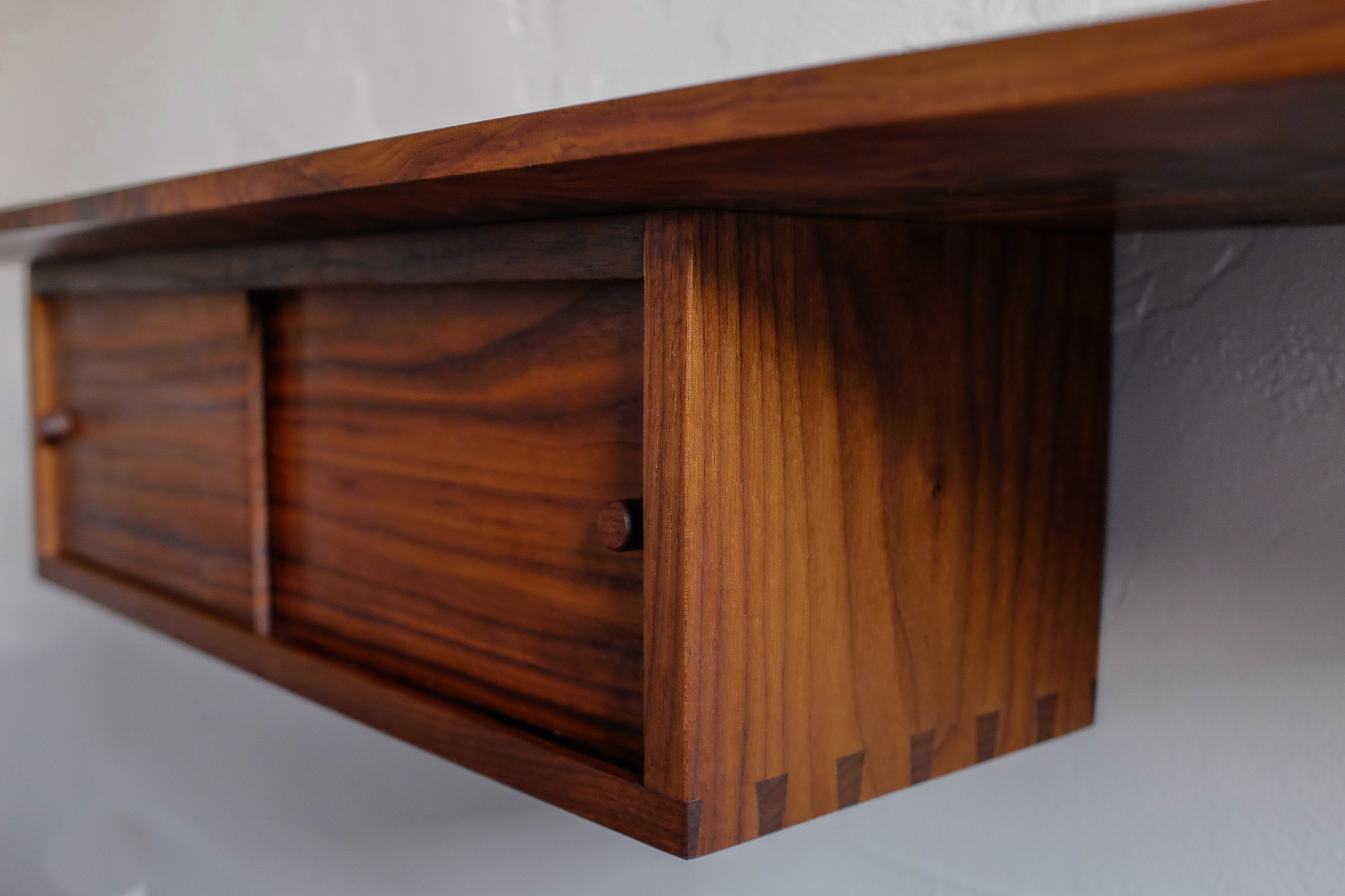 Detail of dovetail and recessed sliding door.