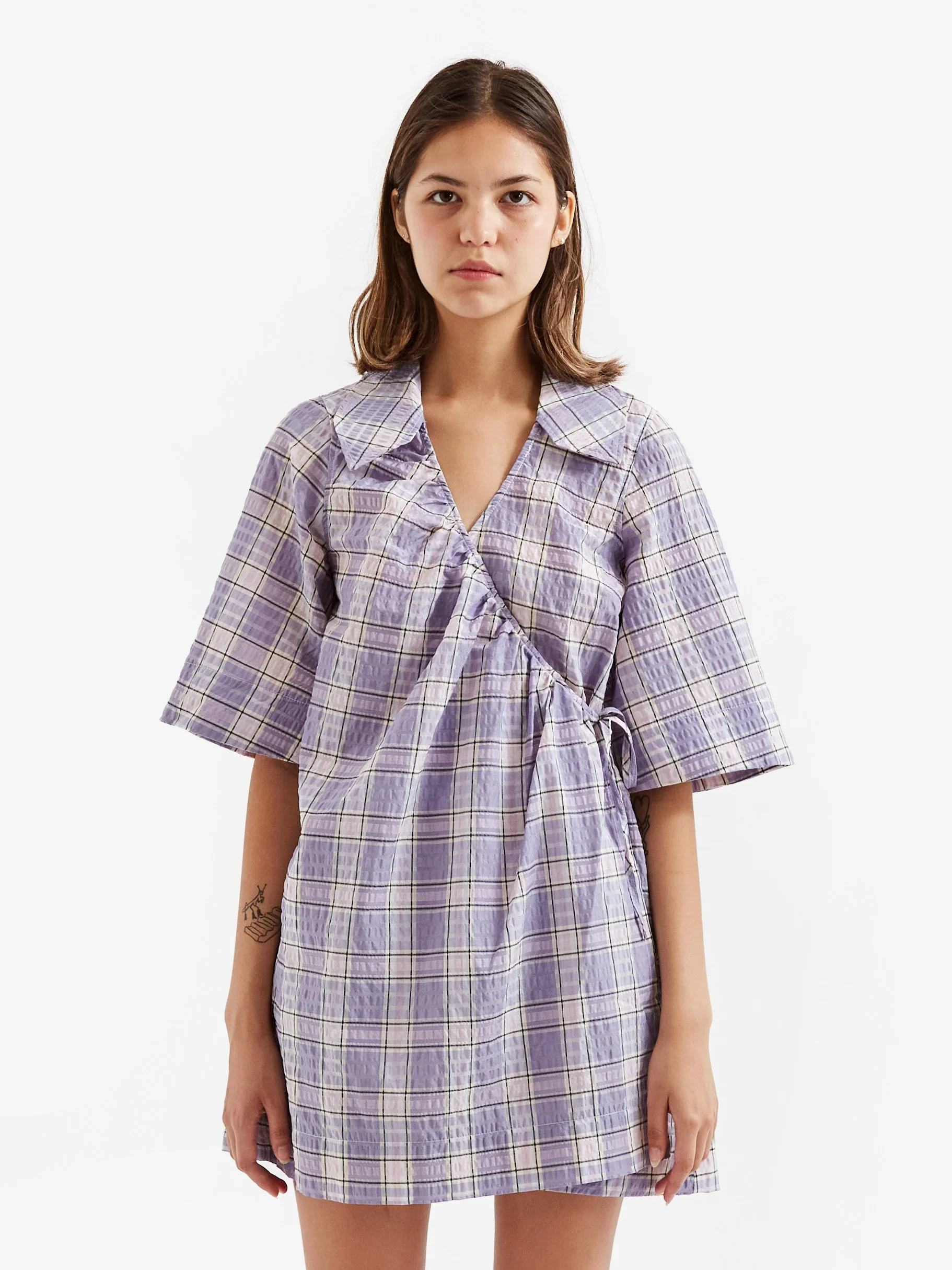 P77531_M_2GANNI-SEERSUCKER-CHECK-MINI-WRAP-DRESS---CHECK-PERSIAN-VIOLET_SS22_GOODHOOD_255_535a8dc0-c21b-4f84-8d38-f3937a929166_1822x.jpg.webp