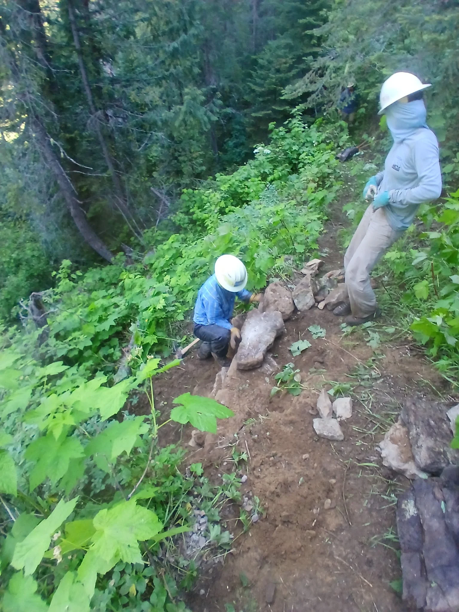 Cooper and Claire working on crib wall.JPG