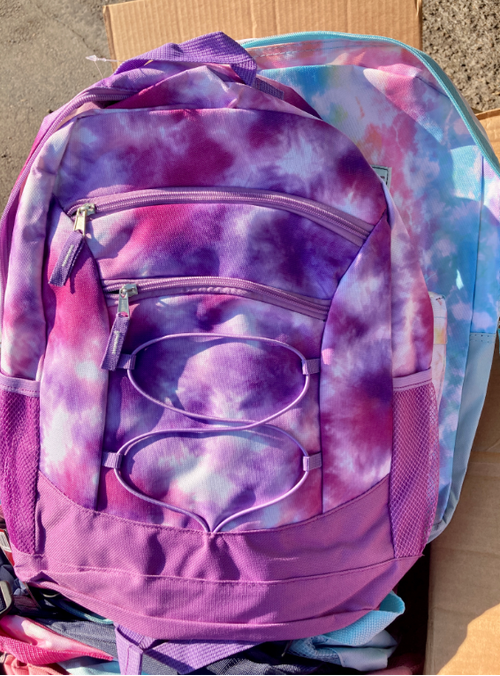 Tie-dye backpacks distributed at Back to School Night