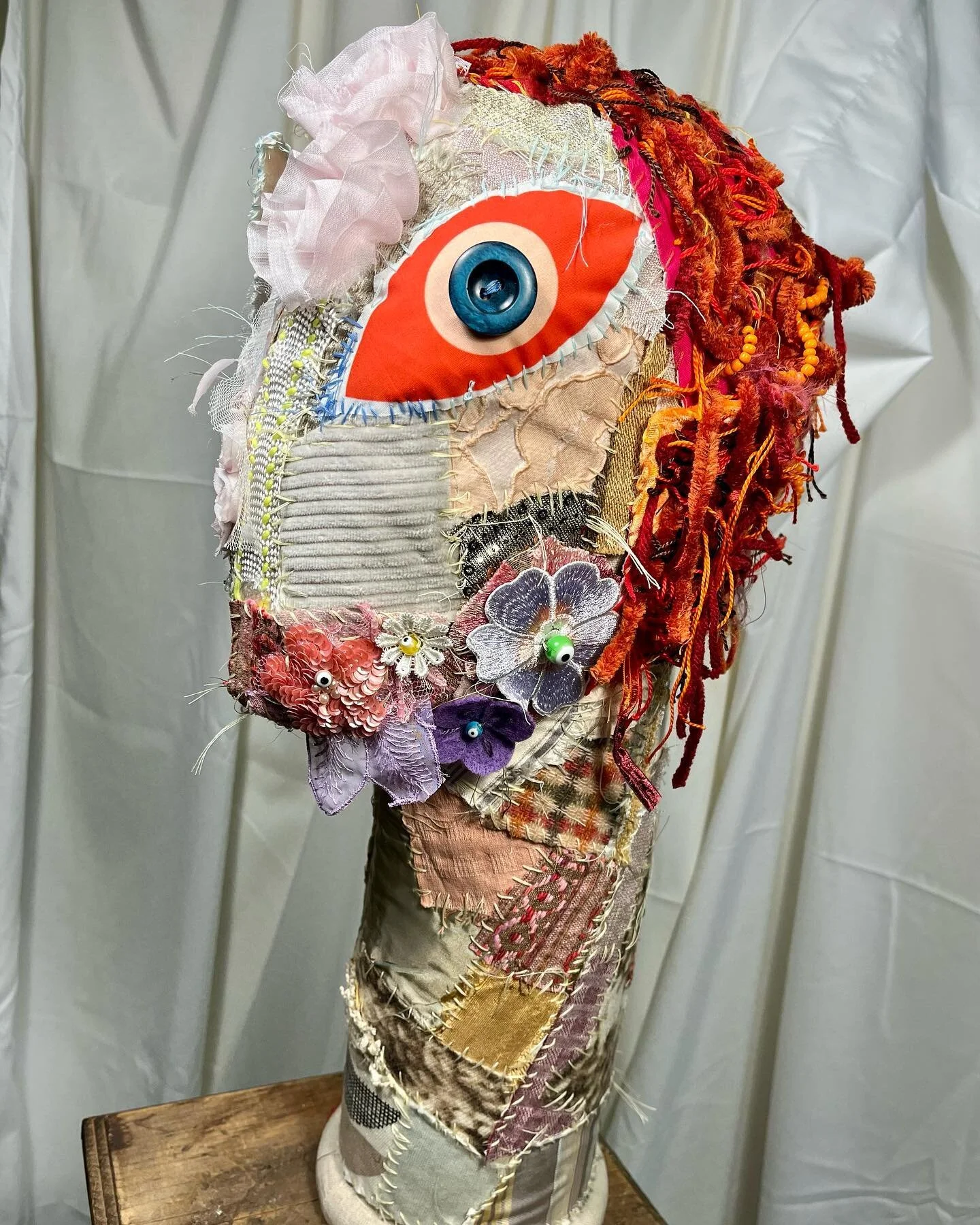 ViewFromHere: significant progress on new oracle, working title is &ldquo;oracle dreaming of a long ago spring afternoon&rdquo; 👁️ still developing the very red textile hair and flower beard, all hand work! Except for the &ldquo;stuffed&rdquo; large