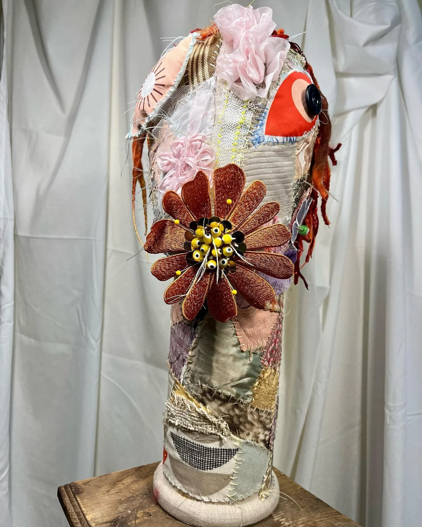 ViewFromHere: front view significant progress on new oracle, working title is &ldquo;oracle dreaming of a long ago spring afternoon&rdquo; 👁️ all handwork, still developing the very red textile hair and flower beard (the pins in the &ldquo;mouth flo